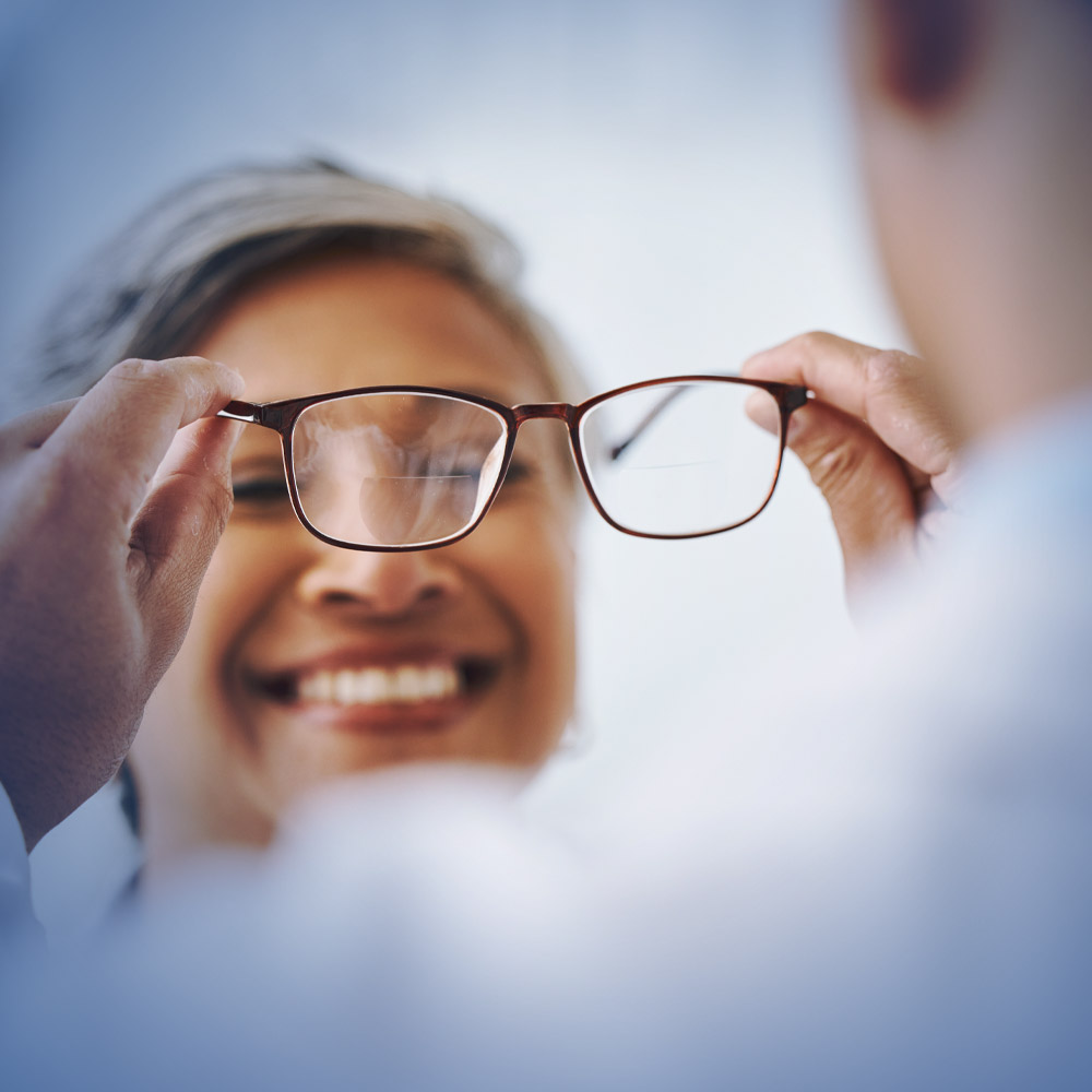 Image of the inside of a beautiful location. a large wall of glasses on the left and a comfortable waiting area to the right. Gulfcoast Eye Care, The Leading Vision Correction Practice for the Tampa Bay and St. Petersburg Areas 